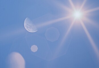 Moon in a Fantasy Sky with Rays of Sunlight