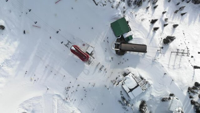 Whistler Mountain chairlift, aerial drone time lapse, ski mountain, sunny day, winter, ski hill. 4k 24fps