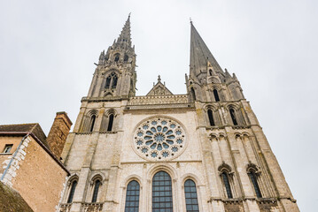 Fototapeta na wymiar Gothic Chartres Cathedral (Cathedral of Our Lady of Chartres or Notre-Dame de Chartres, 1220) - Catholic cathedral of Latin Church. Chartres (90 kilometers southwest of Paris), Eure-et-Loir, France.