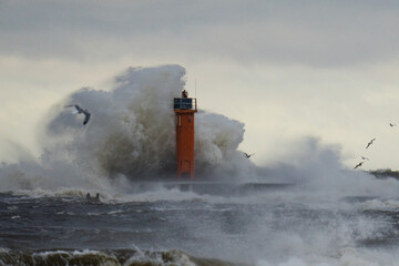 Big storm near a lighthouse