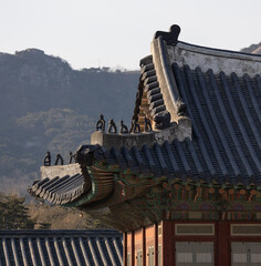 Fototapeta na wymiar Roof motifs in Korean palace, Gyeongbokgung Palace, Seoul, South Korea