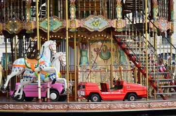 View of the Eiffel Tower with carousel beside, Paris, France