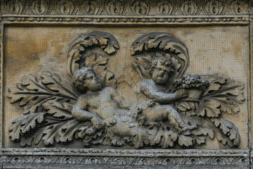 Lviv, Ukraine - February, 2022: Bas-relief on the facade of an ancient building in the city center.
