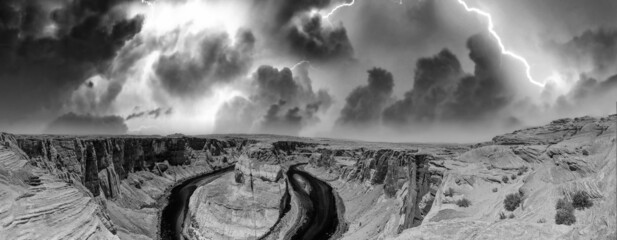Panoramic aerial view of Horseshoe Bend and Colorado River during a storm, Arizona - USA