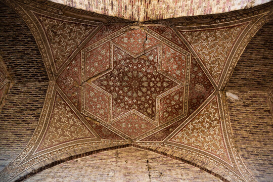 mosaics and ornaments on the walls and ceilings of the Soltaniyeh Mosque in Iran