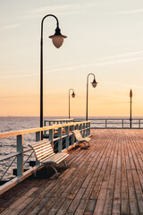 Gdynia Orlowo pier with colors of sunrise. Baltic Sea, Poland