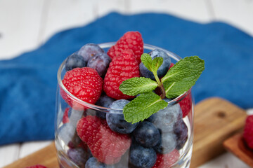 Close up mix of raw berries, strawberry, blueberry, raspberry, healthy food vegan and vegetarian, good for smoothies and recipes