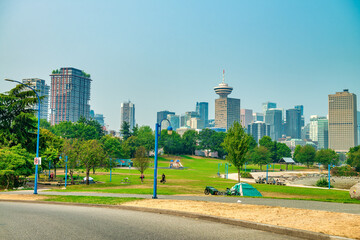 Fototapeta na wymiar Beautiful view of Vancouver skyline from a city park in summer season, Canada.