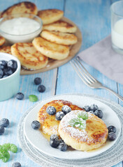 Cottage cheese pancakes - traditional Russian syrniki	