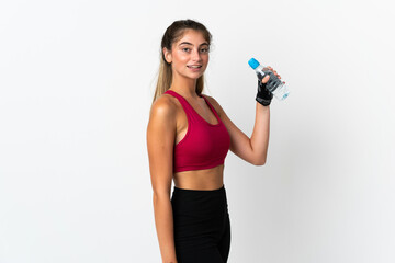 Naklejka premium Young caucasian woman isolated on white background with sports water bottle