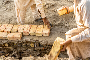 labor working on new building construction site