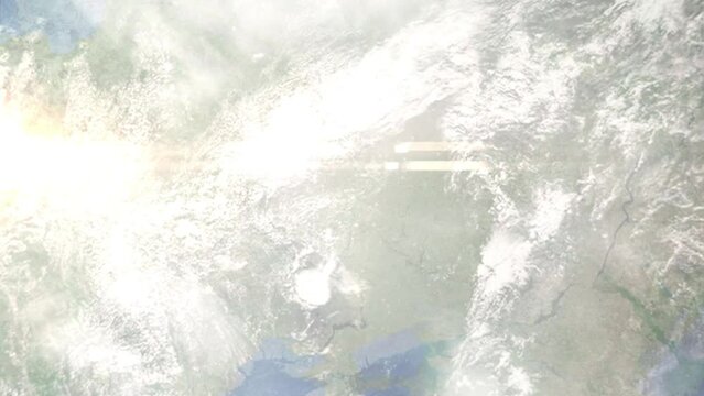 Earth zoom in from outer space to city. Zooming on Sumy, Ukraine. The animation continues by zoom out through clouds and atmosphere into space. Images from NASA