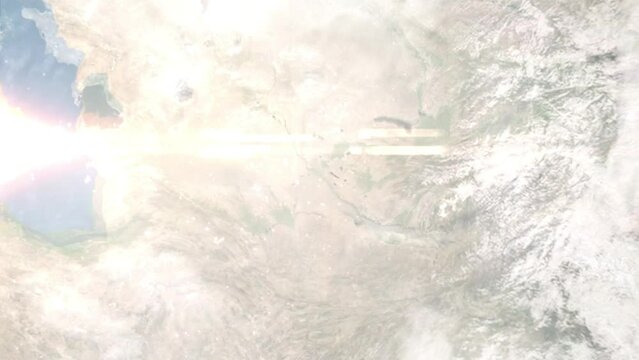 Earth zoom in from outer space to city. Zooming on Turkmenabad, Turkmenistan. The animation continues by zoom out through clouds and atmosphere into space. Images from NASA