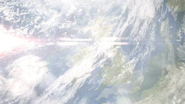 Earth zoom in from outer space to city. Zooming on Belfast, Great Britain. The animation continues by zoom out through clouds and atmosphere into space. Images from NASA