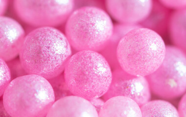 Small sweet pink balloons as a background.
