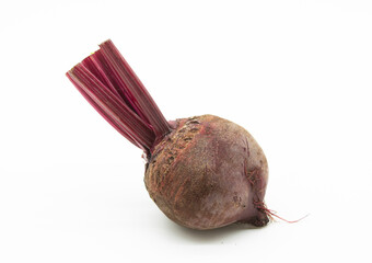 single red beets or beetroots on white background
