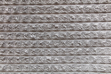 Gray blanket fabric as an abstract background.