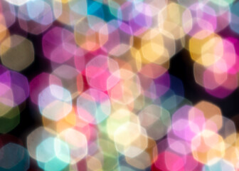 Multicolored festive bokeh as background.