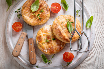 Hot roasted halloumi cheese as food for a vegetarian barbecue.