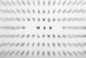 Word War in crossword letters with motion focus effect