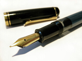 Macro shot of a noble fountain pen as a symbol for economy and business!