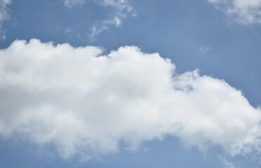 cloud spreading on bright sky in sunny day