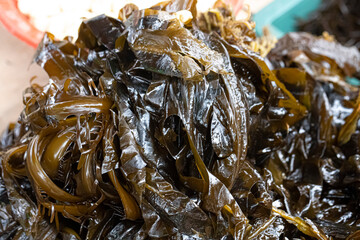 Seaweed in bucket selling in seafood market.