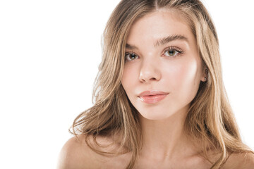Fototapeta premium Close up portrait of a girl posing in studio while smiling. Natural make up