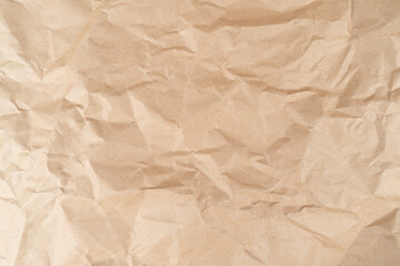 Crumpled paper brown background. Old paper background. Old crumpled vintage paper surface. Paper pattern