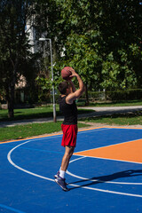 Obraz premium Basketball player jump shooting and playing basketball.