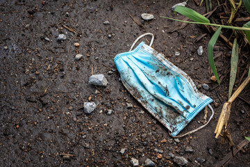 Medical waste face mask that was Improperly discarding. that has been used and carelessly throwing....