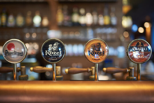 Pourers of beer at the bar in the nightclub