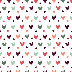 Seamless pattern with floral elements and hearts. Background in red, orange and brown colors.