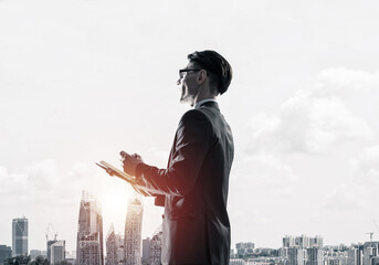 Concept of business success and control with confident boss against cityscape background