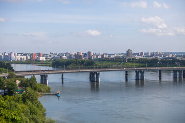 Obraz premium View of the Kuznetsky bridge, Tom river. City of Kemerovo, Russia