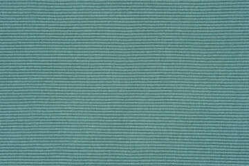 Green jersey texture. Knit cloth background. Ribbed jersey fabric.