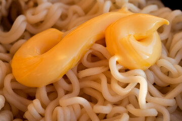 Instant noodles close-up. Spaghetti and pasta with sauce. Healthy food.