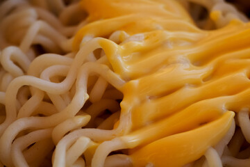 Instant noodles close-up. Spaghetti and pasta with sauce. Healthy food.