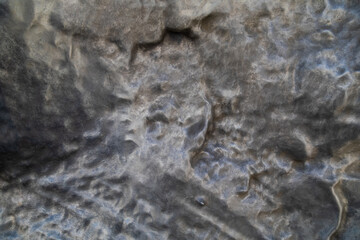 Heterogeneous background of the metal surface with dents and convex areas. Overflows and geometric background pattern