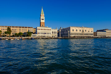 Fototapeta na wymiar panoramic view from a boat to the mark's square with clocktower campanile and doge's palace in venice, italy
