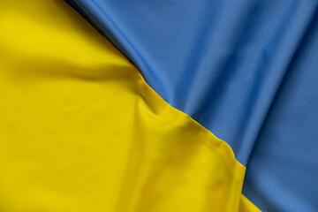 Yellow-blue national flag of Ukraine as a background, stop war and peace