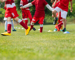 Young soccer players running