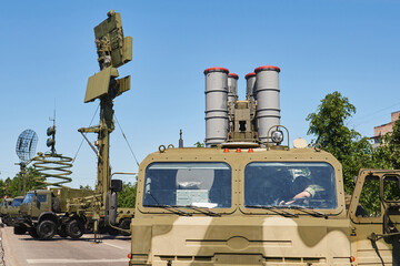cockpit of a military vehicle with a combat-ready anti-aircraft missile system with communication...