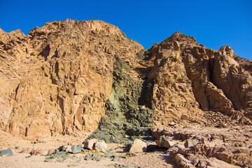 Colored canyon with red limestone and black basalt rocks, Nabq protected area, Sharm El Sheikh,...