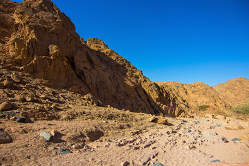 Colored canyon with red limestone rocks, Nabq protected area, Sharm El Sheikh, Sinai peninsula, Egypt, North Africa. Egyptian safari	