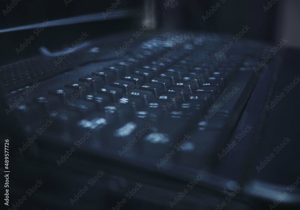 Poster typo for your thoughts. closeup shot of a keyboard in a server room.