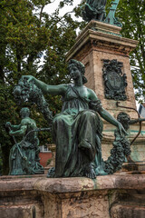 Fototapeta na wymiar Lindau, Germany. One of the bronze sculptures of the Lindavia Fountain