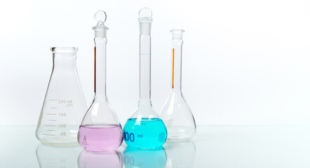 Science laboratory chemistry beakers, Erlenmeyer and round flask laboratory glassware concept research and development. biology and pharmaceutical industry concept.                    