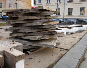 Concrete blocks and building materials on the street.