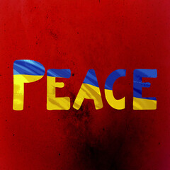 Żółto niebieski napis peace pokój na czerwonym tle - obrazy, fototapety, plakaty
